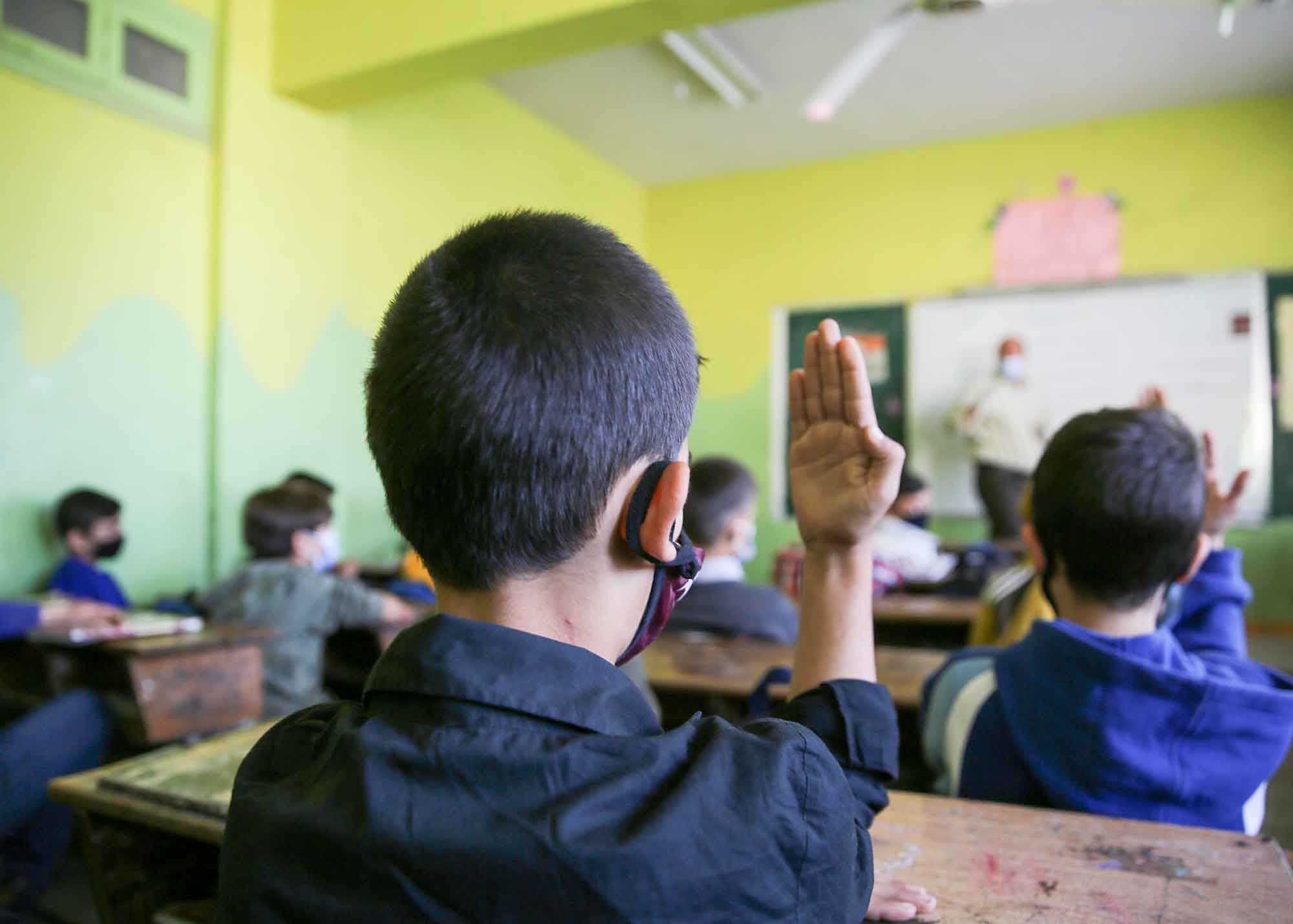 A child raise his hand in Violet's school in northwest of Syria / Idlib - Syria